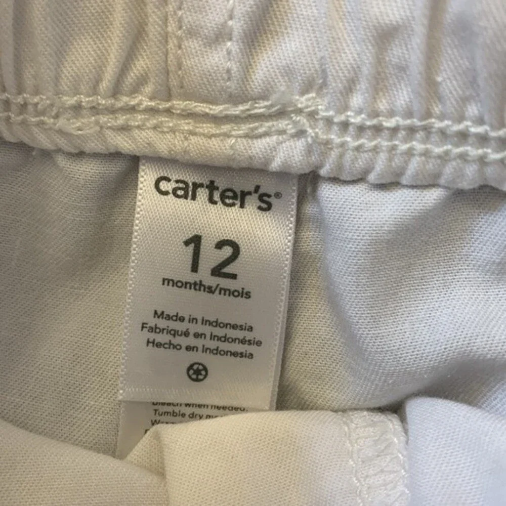 Carter's 12 month baby girl set of top and shorts.